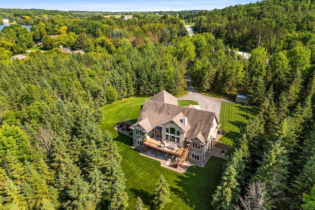 14595 Louis Corners Rd, Kiel, WI 53042 - aerial view of property and surrounding area with a heavily wooded area