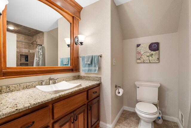 14595 Louis Corners Rd, Kiel, WI 53042 - full bathroom with vanity, tile patterned floors, curtained shower, and lofted ceiling