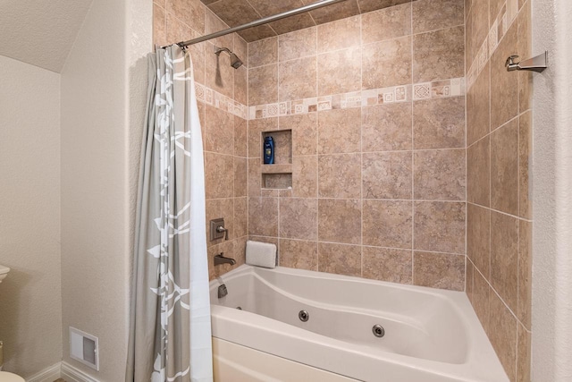 14595 Louis Corners Rd, Kiel, WI 53042 - bathroom with a combined bath / shower with jetted tub and a textured wall