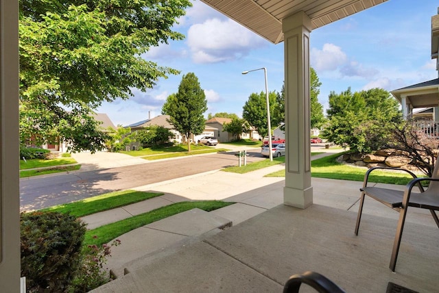 525 Hercules Trl, Madison, WI 53718 - view of patio / terrace featuring a residential view