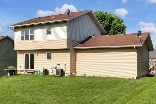 525 Hercules Trl, Madison, WI 53718 - rear view of property with a lawn and a shingled roof
