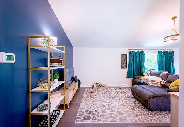 11812 Fox River Rd, Twin Lakes, WI 53181 - living area with dark wood-style floors and lofted ceiling
