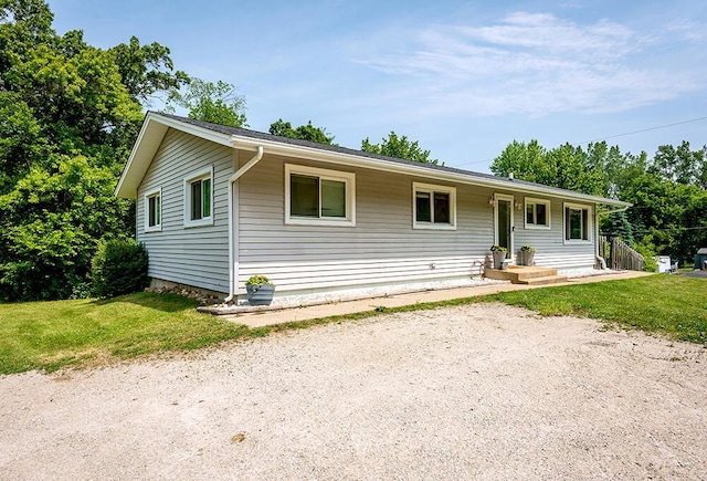 11812 Fox River Rd, Twin Lakes, WI 53181 - ranch-style house featuring a front lawn