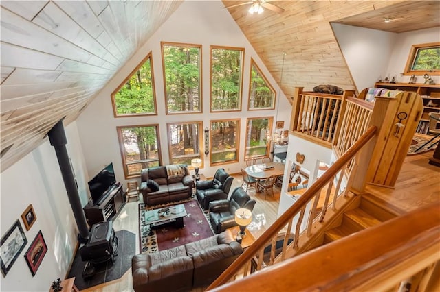 9926 W Birch Circle Dr, Ladysmith, WI 54848 - living room with wooden ceiling, high vaulted ceiling, a ceiling fan, and wood finished floors