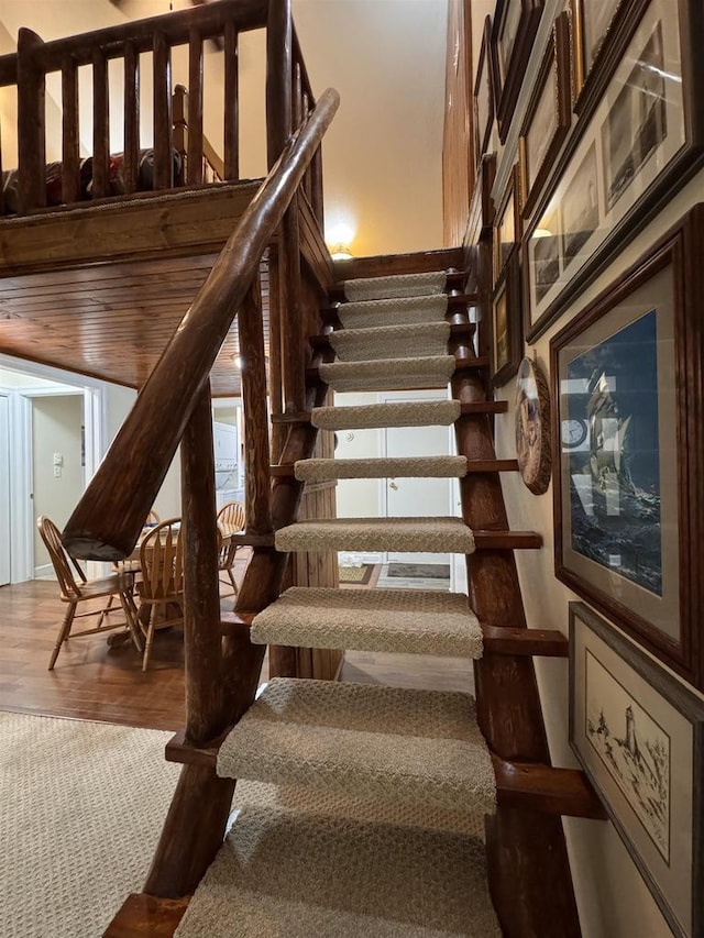 8 Balsam Trl, Wisconsin Dells, WI 53965 - stairway featuring wood finished floors