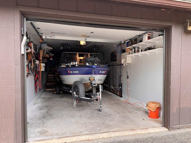 8 Balsam Trl, Wisconsin Dells, WI 53965 - garage featuring a garage door opener