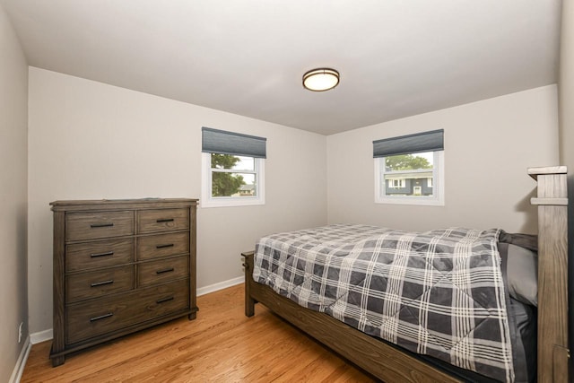 6913 Butternut Rd, Racine, WI 53402 - bedroom featuring multiple windows and light wood-type flooring