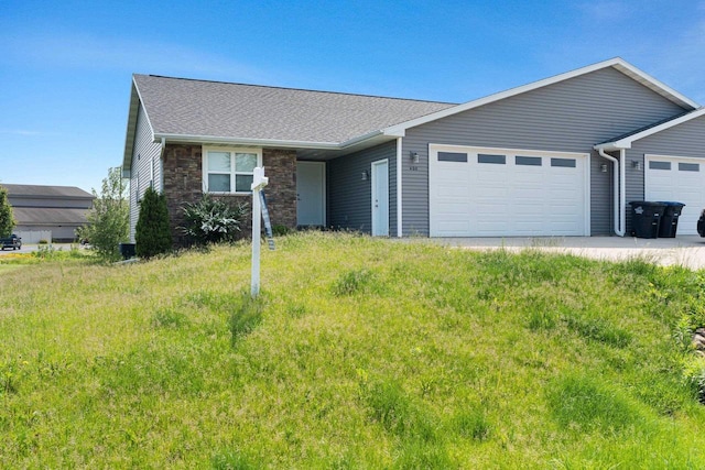 400 Tristan Dr, Shawano, WI 54166 - single story home featuring a garage, stone siding, and a shingled roof