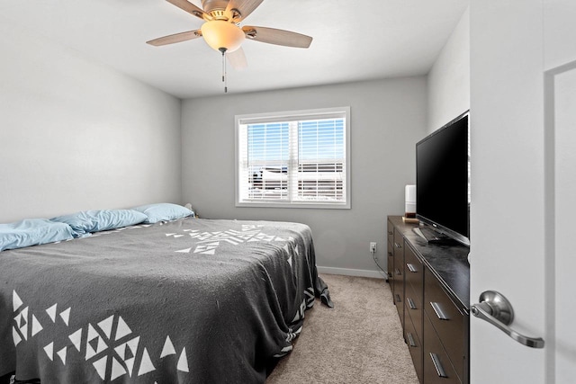 400 Tristan Dr, Shawano, WI 54166 - bedroom with light carpet and a ceiling fan