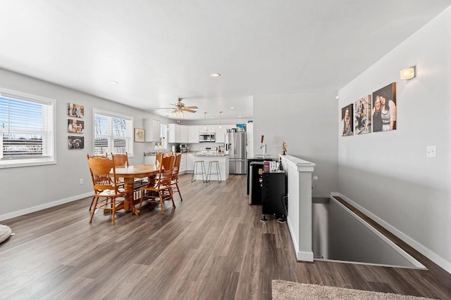 400 Tristan Dr, Shawano, WI 54166 - dining room featuring light wood-style flooring, a ceiling fan, and recessed lighting