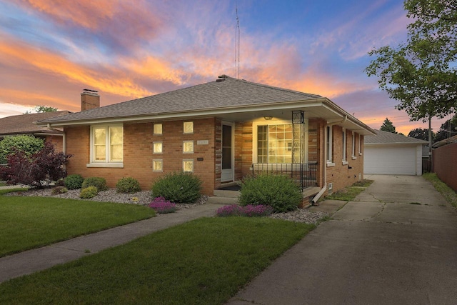 7631 38th Ave, Kenosha, WI 53142 - single story home featuring covered porch, brick siding, a yard, a garage, and an outdoor structure