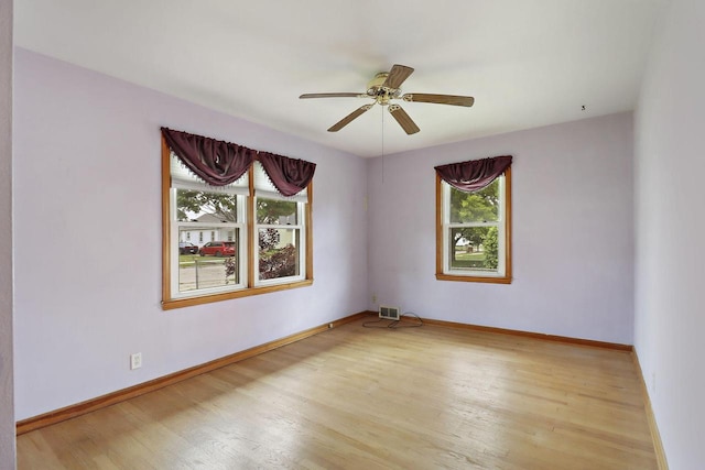7631 38th Ave, Kenosha, WI 53142 - spare room featuring plenty of natural light, light wood-style flooring, and a ceiling fan