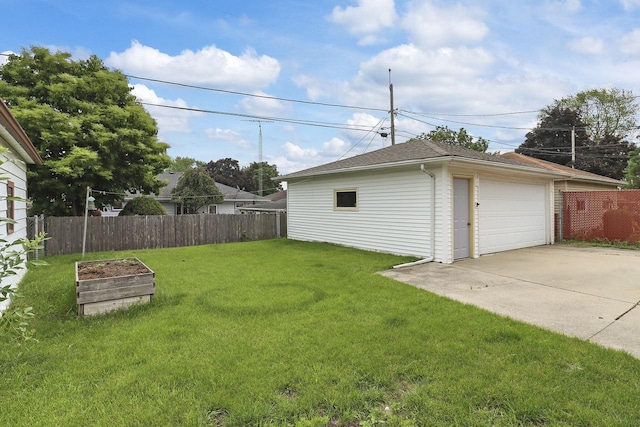 7631 38th Ave, Kenosha, WI 53142 - view of yard featuring a detached garage, an outdoor structure, and a garden