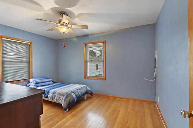 7631 38th Ave, Kenosha, WI 53142 - bedroom with light wood-style flooring and a ceiling fan