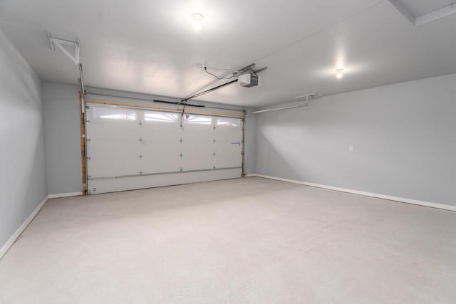 922 Vogt Ln, Chilton, WI 53014 - garage with a garage door opener and baseboards