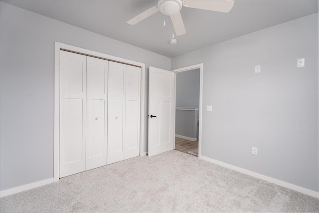 922 Vogt Ln, Chilton, WI 53014 - unfurnished bedroom featuring carpet flooring, a closet, and a ceiling fan