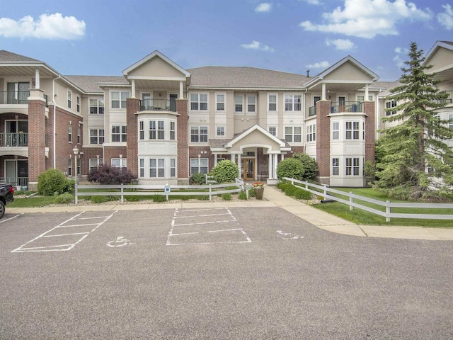 8530 Greenway Blvd Unit 104, Middleton, WI 53562 - view of building exterior with uncovered parking