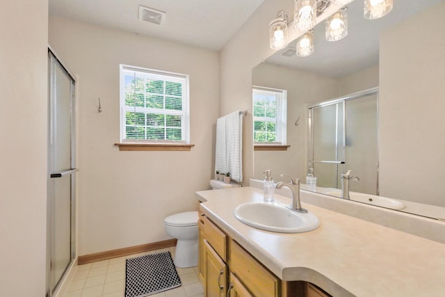 4140 W Lakeview Dr, Franklin, WI 53132 - full bathroom featuring healthy amount of natural light, a shower stall, vanity, and tile patterned flooring