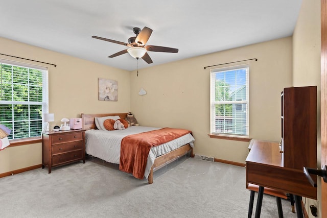 4140 W Lakeview Dr, Franklin, WI 53132 - bedroom with multiple windows, light colored carpet, and a ceiling fan