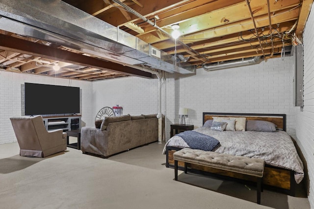 4140 W Lakeview Dr, Franklin, WI 53132 - bedroom featuring concrete flooring and brick wall