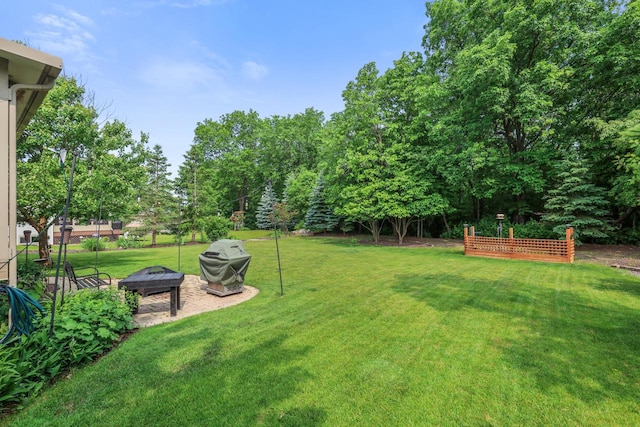 4140 W Lakeview Dr, Franklin, WI 53132 - view of green lawn with an outdoor fire pit and view of scattered trees