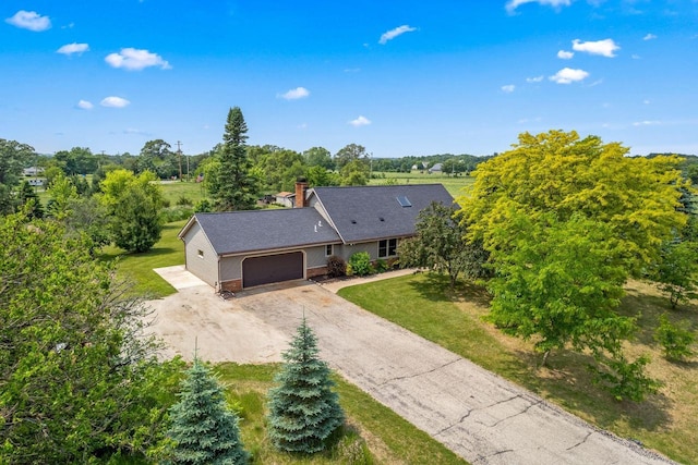 W330S7517 Split Rail Dr, Mukwonago, WI 53149 - view of subject property with a tree filled landscape