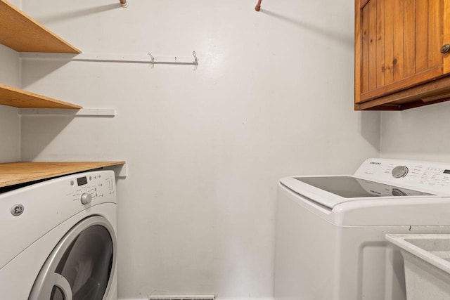 W330S7517 Split Rail Dr, Mukwonago, WI 53149 - washroom featuring cabinet space