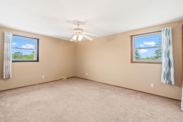 W330S7517 Split Rail Dr, Mukwonago, WI 53149 - spare room featuring light colored carpet and ceiling fan