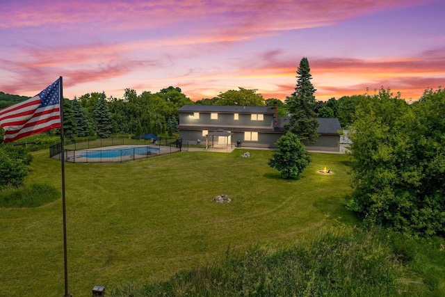 W330S7517 Split Rail Dr, Mukwonago, WI 53149 - yard at dusk featuring a patio area