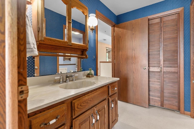 6352 Black Wolf Point Ln, Oshkosh, WI 54902 - bathroom featuring vanity and wallpapered walls
