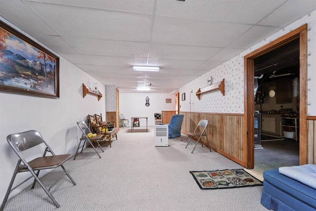 38 Bowen St, Oshkosh, WI 54901 - living area with wainscoting, carpet floors, and a drop ceiling