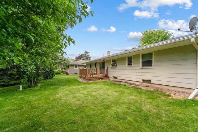 38 Bowen St, Oshkosh, WI 54901 - view of green lawn with a deck