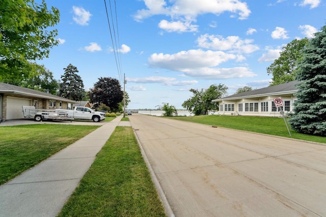38 Bowen St, Oshkosh, WI 54901 - view of concrete street featuring traffic signs