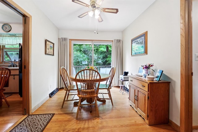 38 Bowen St, Oshkosh, WI 54901 - dining space with light wood-type flooring and ceiling fan