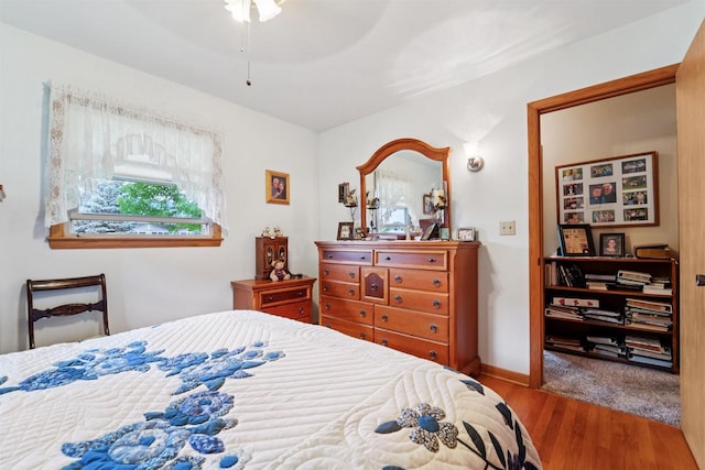 38 Bowen St, Oshkosh, WI 54901 - bedroom with wood finished floors and baseboards