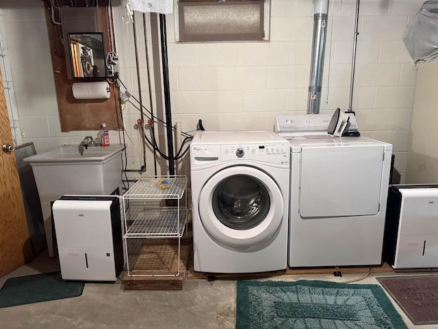 317 Reed St, Chilton, WI 53014 - laundry room with washer and dryer and concrete block wall