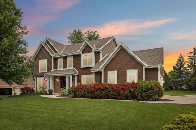 W151N10146 W Windsong Cir, Germantown, WI 53022 - view of front of house featuring a shingled roof and a lawn