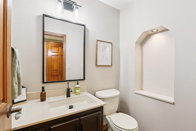 W151N10146 W Windsong Cir, Germantown, WI 53022 - bathroom featuring vanity and toilet