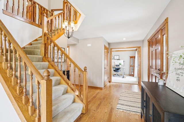W151N10146 W Windsong Cir, Germantown, WI 53022 - entrance foyer with light wood-style floors, stairway, and recessed lighting