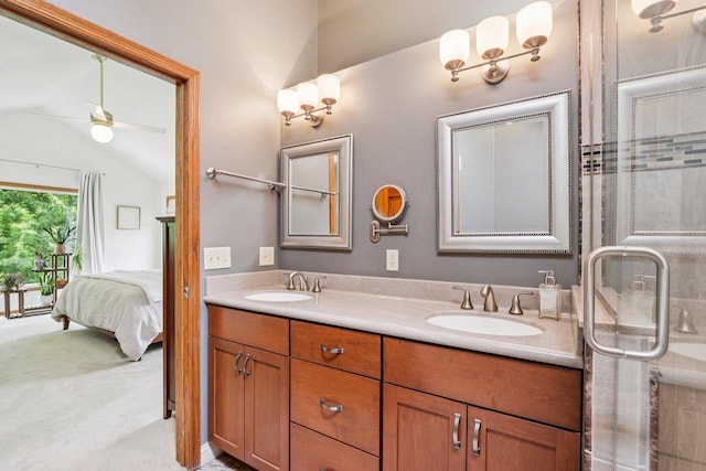 W151N10146 W Windsong Cir, Germantown, WI 53022 - bathroom with double vanity, lofted ceiling, ceiling fan, and connected bathroom