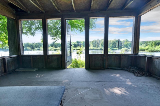 N14066 Squaw Creek Rd, Wausaukee, WI 54177 - unfurnished sunroom with plenty of natural light and a water view