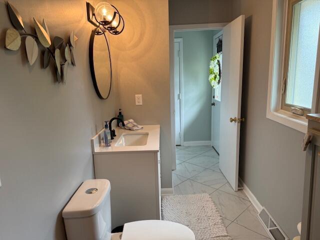 4005 86th Pl, Kenosha, WI 53142 - bathroom with vanity and marble finish floors