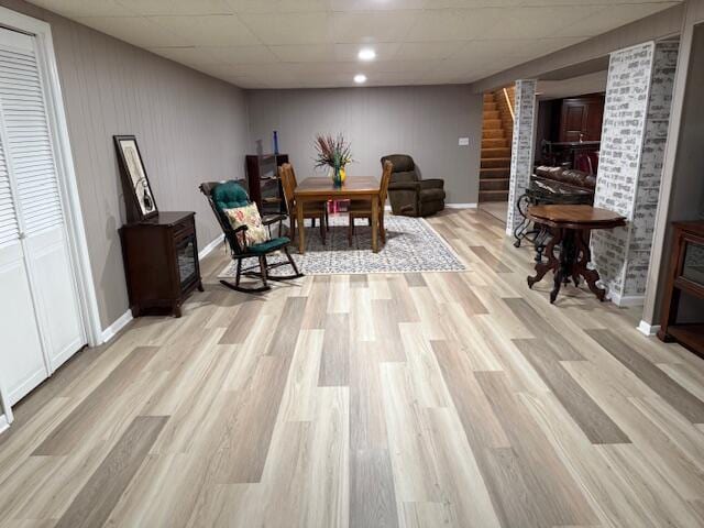 4005 86th Pl, Kenosha, WI 53142 - sitting room featuring light wood-style flooring, stairway, and a paneled ceiling