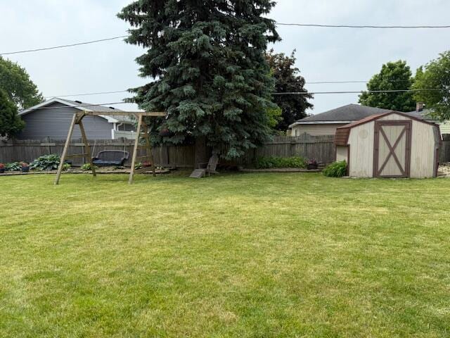 4005 86th Pl, Kenosha, WI 53142 - fenced backyard with a storage shed