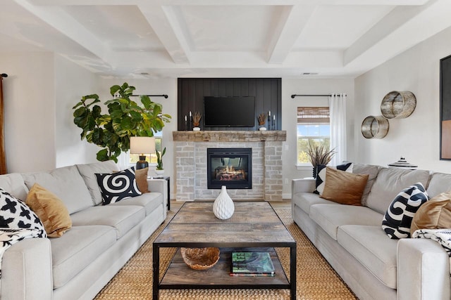 1887 Woodland Way, Slinger, WI 53086 - living room featuring beamed ceiling, a fireplace, and wood finished floors