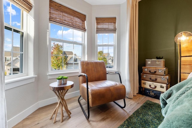 1887 Woodland Way, Slinger, WI 53086 - living area with light wood-style flooring and baseboards