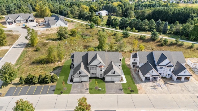 1887 Woodland Way, Slinger, WI 53086 - aerial view of residential area featuring a heavily wooded area