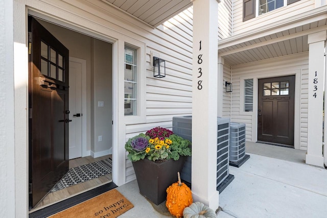 1887 Woodland Way, Slinger, WI 53086 - doorway to property featuring a porch
