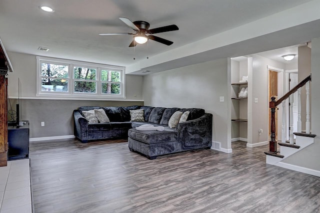 324 Nancy Ln, Pulaski, WI 54162 - living area with a ceiling fan, wood finished floors, and stairway