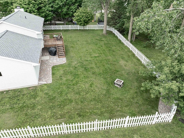 324 Nancy Ln, Pulaski, WI 54162 - fenced backyard with a wooden deck, stairs, and view of scattered trees